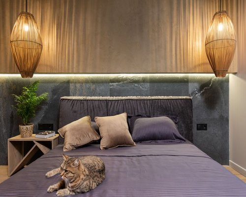 Cozy bedroom setup with dim ambient lighting