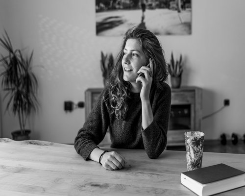 Woman taking a screen break at home office looking relaxed